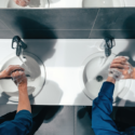 Men washing hands
